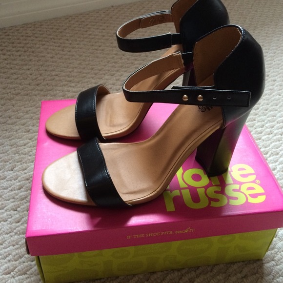 Never worn black slick heals