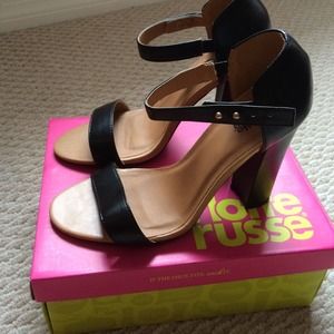 Never worn black slick heals