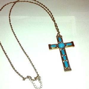Turquoise cross necklace.