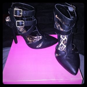 Black strapped belted heels