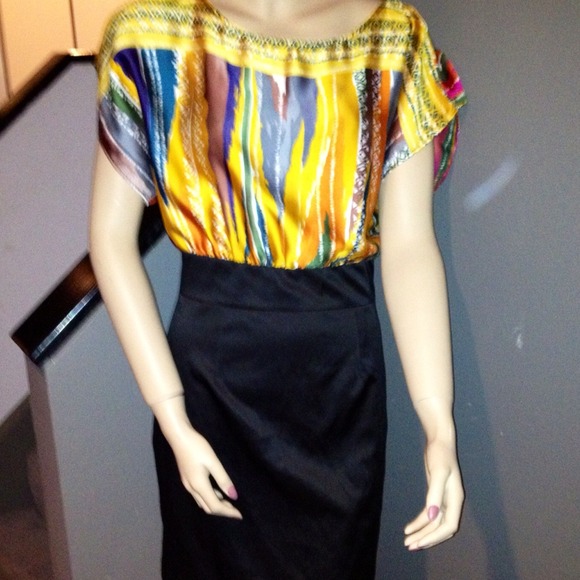 Multicolored on top and black on bottom dress.