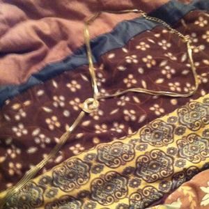 Gold knotted necklace