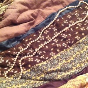 Long faux pearl necklace