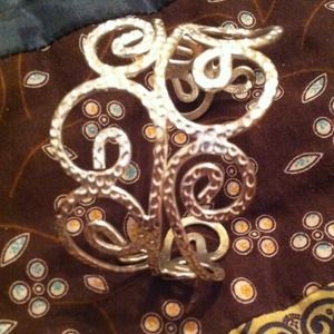 Silver spiral embellished cuff
