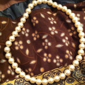 Faux pearl necklace.