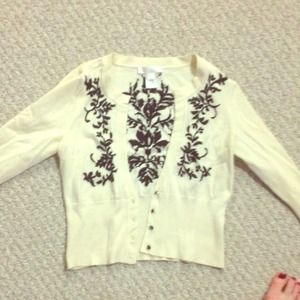 Cream sweater with black beading detail