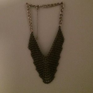 Armor necklace and vintage fedora