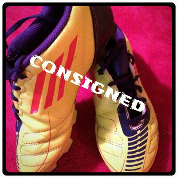 Adidas youth soccer cleats.