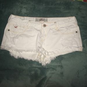HOLLISTER white super distressed denim shorts