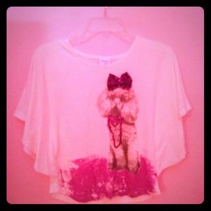 White shirt with dog wearing a bow