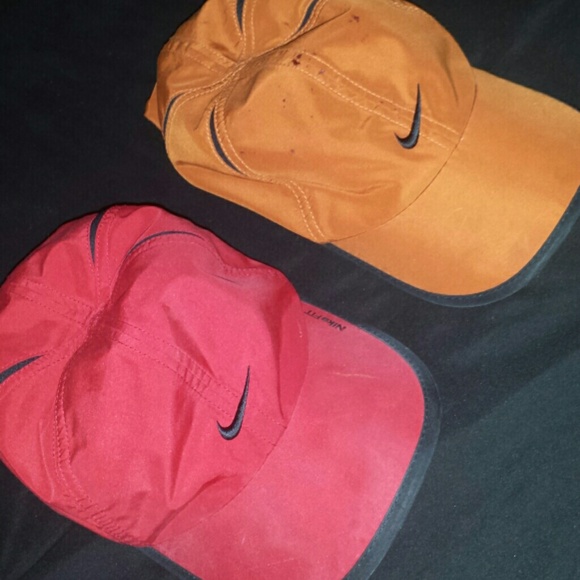 Soft red and burnt orange Nike sports hats!