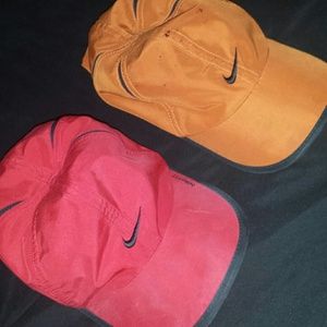 Soft red and burnt orange Nike sports hats!