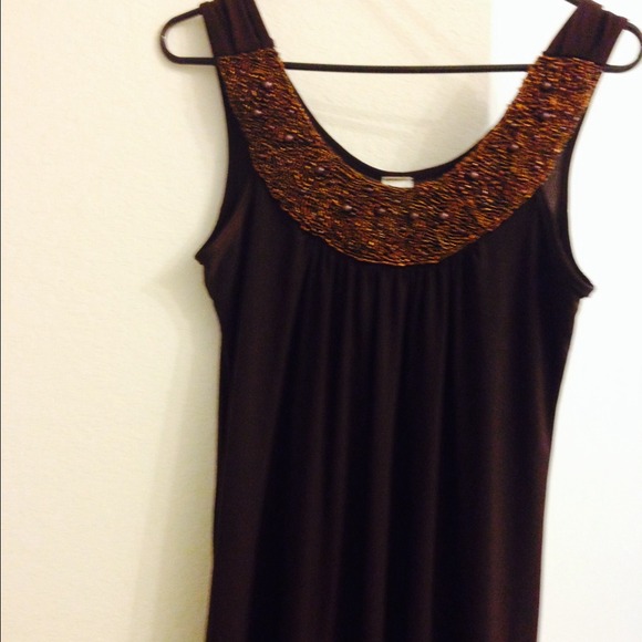 Gorgeous blouse with beaded details on the neck