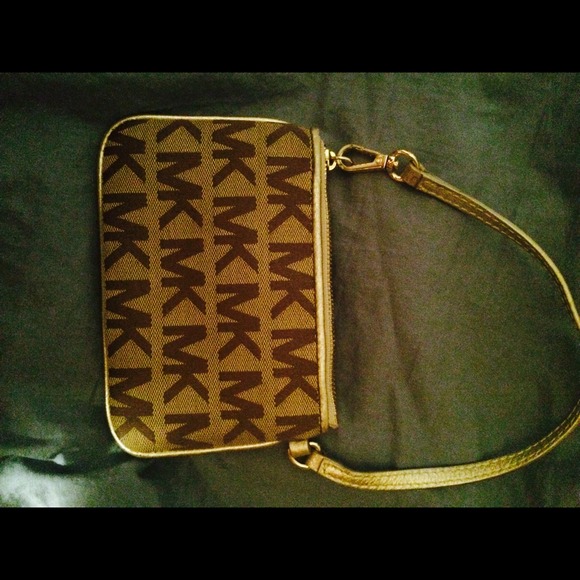 HOLD.  Authentic michael kors wristlet