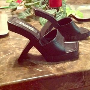 Black leather retrospect with x heel