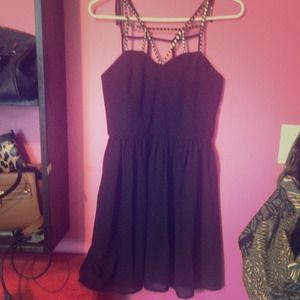 Black dress with strap design