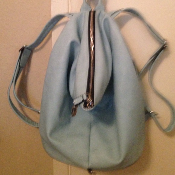 NWOT leather backpack.