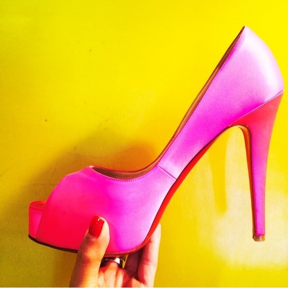 **Sold** Christian Louboutin Pink peep toe pumps