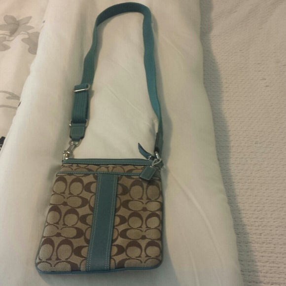 Reduced Coach cross body sling purse.