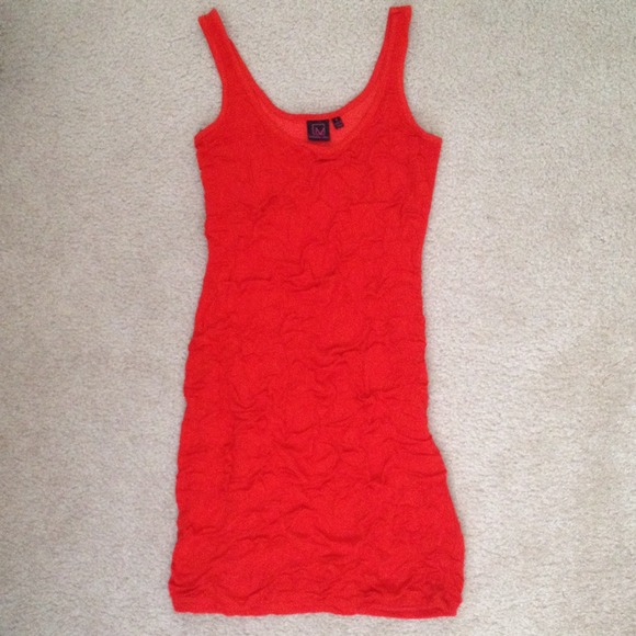 Bright orange/reddish mini dress.