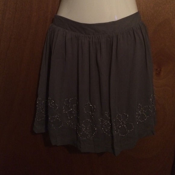Gray beaded JLo flared skirt.