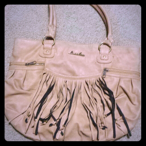 Tan tassel purse (: