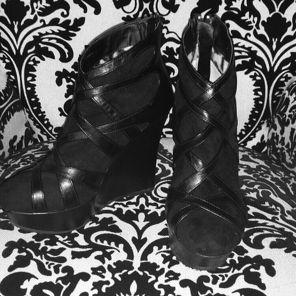 Black platforms with stripped design