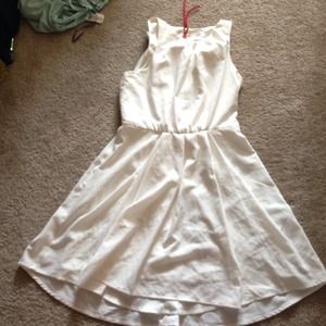Medium white never worn dress with red zipper