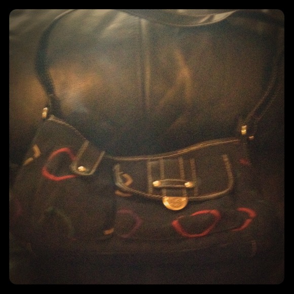 Small black purse with designs