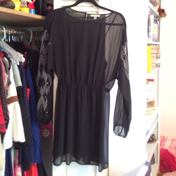 Black long sleeve dress with embellished sleeves