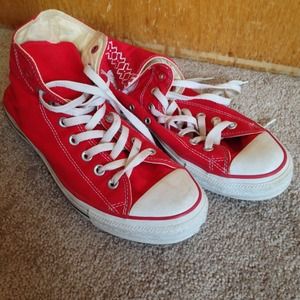 (Converse) Red high tops.