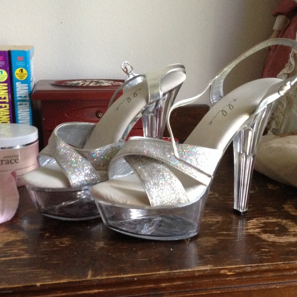 Clear and glittery heels. Never worn!