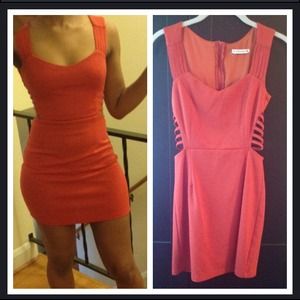 Orange cut out dress.