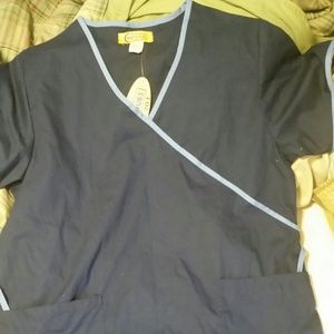 Medical scrubs dark blue with light blue trim