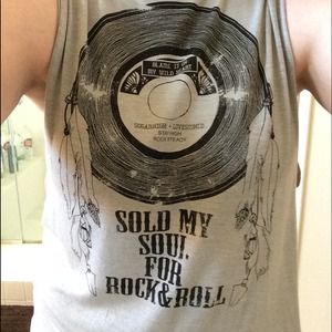 One of a kind oversized tank with fringe back.