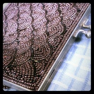 Beaded clutch with broken shoulder chain