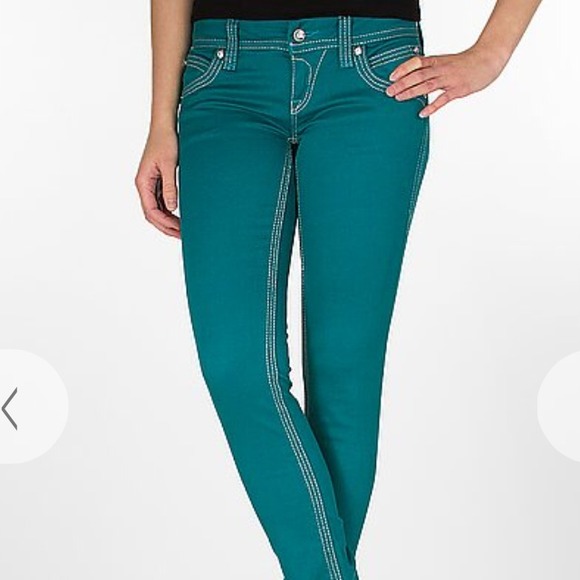 ISO ROCK REVIVAL COLORED JEANS SIZE 25