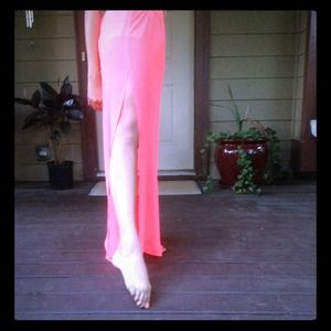 Hot pink long skirt with a cut down on each side