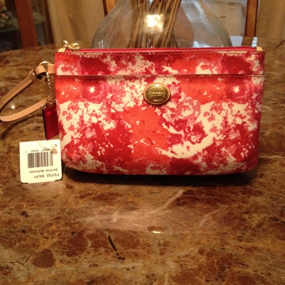 Coach Handbags - Hold for tabbi1414 #130 Authentic Peyton Wristlet.