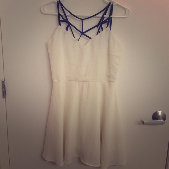 White with black strap lovely dress.