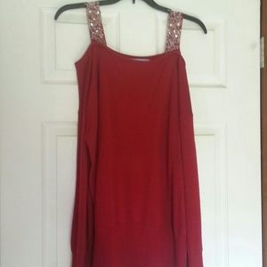 Red sweater off shoulder