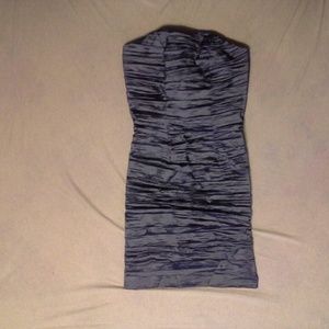 Tube top, above knee dress.