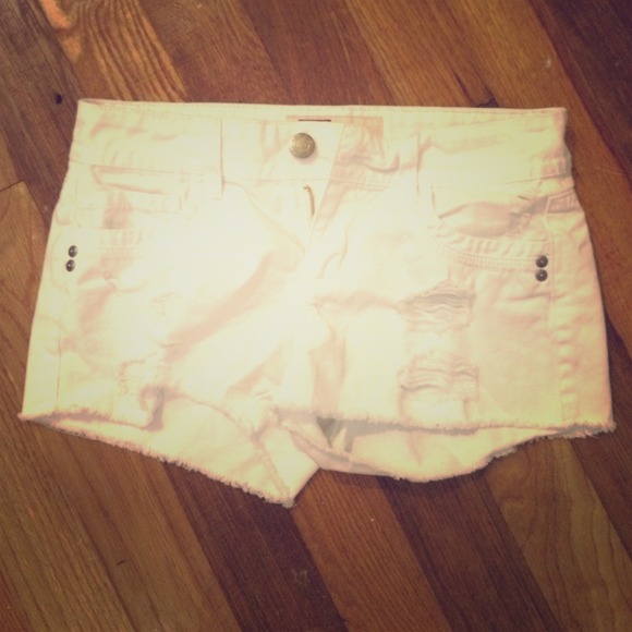 White distressed shorts