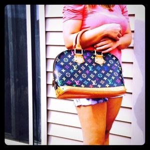 Authentic louis Vuitton alma satchel