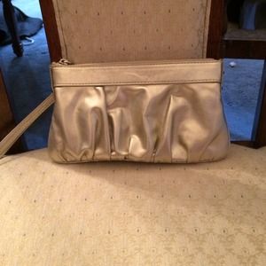 Express gold clutch purse.