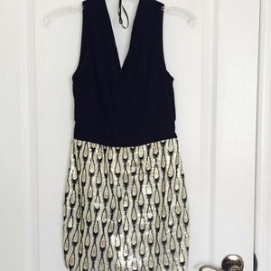 Black and gold sequined dress