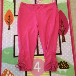 HOLD.   Nike pink dri-fit Capri pants medium