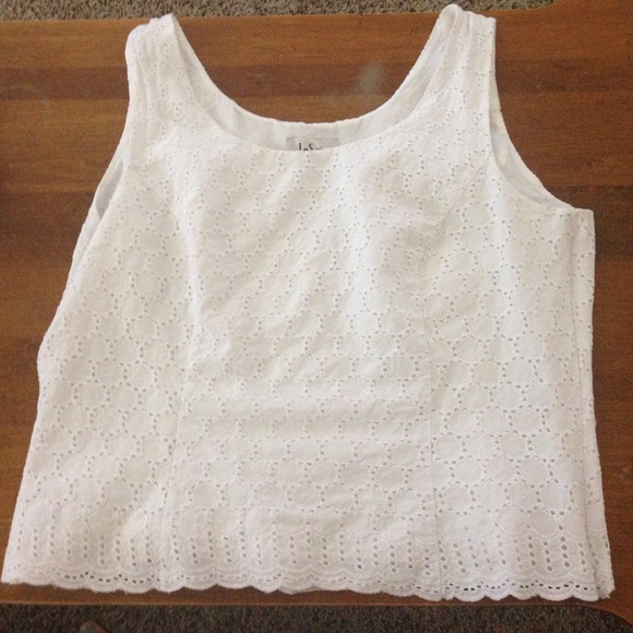 White le suit tank top with eyelit detail.