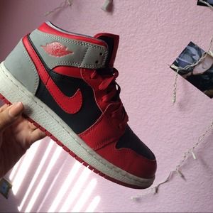 Red, Grey, and black Nike Air Jordan's