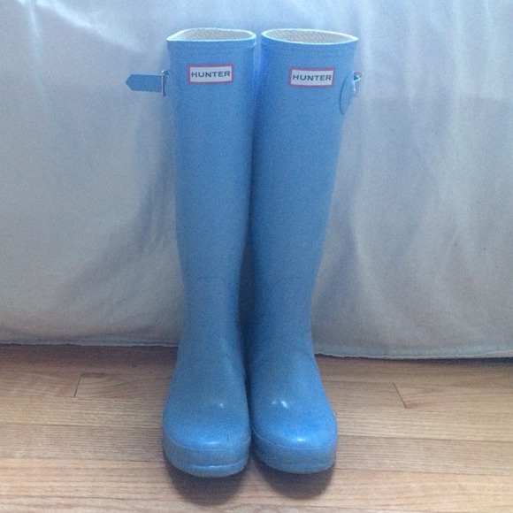 Hunter rain boots.